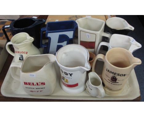Tray of assorted advertising water jugs to include Wade black and white scotch whiskey, Johnnie Walker, Bells scotch whiskey,