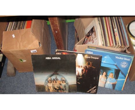 Two boxes of assorted LP's to include Abba, Rod Stewart, Peters and Lee, David Cassidy, The Rolling Stones, Tina Turner etc. 