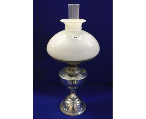 20th Century white metal single burner oil lamp with cream shade and clear glass funnel.  