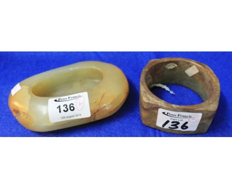Chinese mutton fat hardstone cushion shaped brush pot and a soapstone armulet.  (2) CONDITION REPORT: Wear with age but no se
