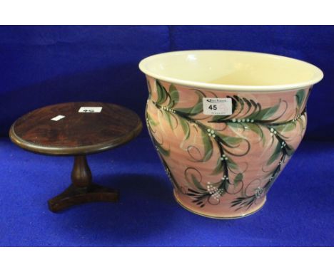 Gwili pottery floral jardiniere with designers name to base, together with mahogany miniature tripod dolls table.  (2)