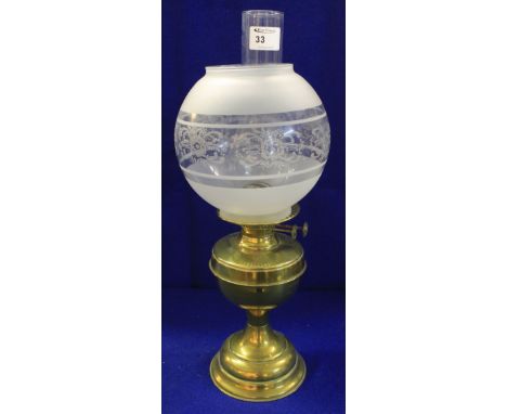 Duplex brass double burner oil lamp with etched shade and clear glass funnel.