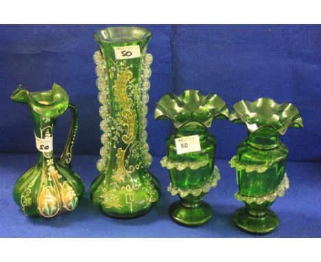 Pair of late Victorian green glass urn shaped vases with waved ring and clear petal decoration, together with a green glass e