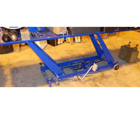 A Silverline motorcycle repair bench, with hydraulic rise-and-fall action, painted in blue enamel1000lbs (454kg)