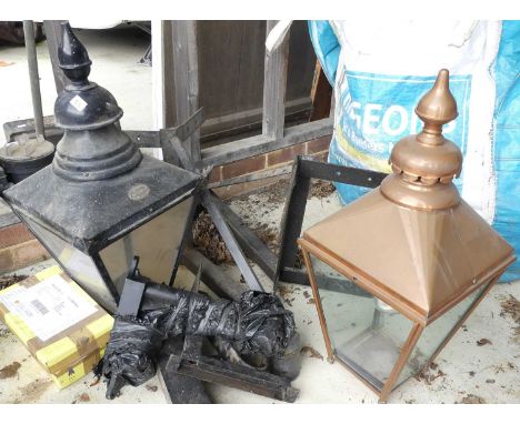 A pair of Victorian style copper street lanterns, boxed and unused; together with another similar but incomplete example; a b