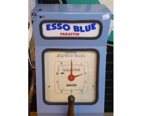A fully restored metal paraffin pump advertising ESSO Blue, with clock face dial, h.137cm