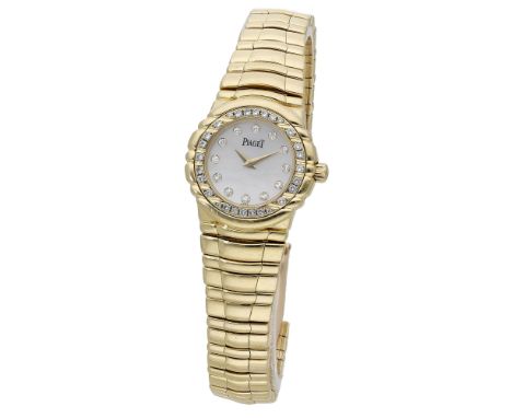 Piaget. A lady’s gold and diamond-set bracelet watch, Ref. 16033, Tanagra, circa 1999. Movement: quartz. Dial: mother-of-pear