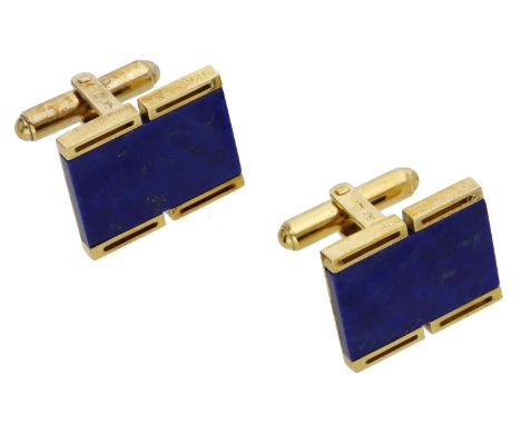 A pair of lapis lazuli cufflinks, the rectangular-shaped lapis lazuli plaques set within pierced polished borders, stamped ‘5