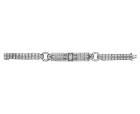 An Art Deco diamond bracelet, set with a marquise-shaped diamond with graduated baguette-cut diamonds to either side, with ca