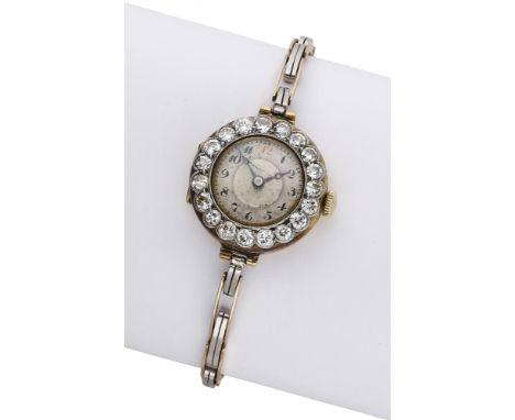 Swiss. A lady’s gold and diamond-set cocktail watch, circa 1919. Movement: manual winding, 15 jewels. Dial: silvered, Arabic 