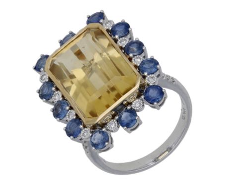 A gem-set dress ring, the step-cut citrine within a surround of circular-cut sapphires and brilliant-cut diamonds, between si