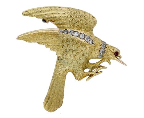 A gem-set eagle brooch, realistically modelled with textured feathers, with graduated single-cut diamond accents to collar an