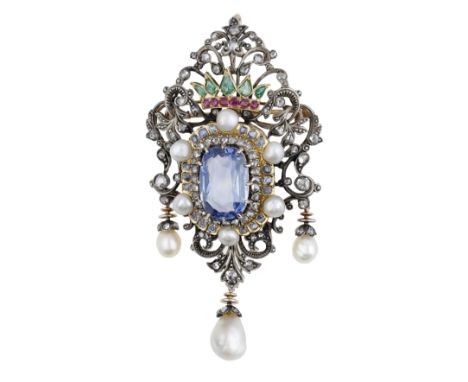 An antique sapphire and gem set jewel, the central cushion-shaped sapphire within a rose-cut diamond and sapphire cluster sur