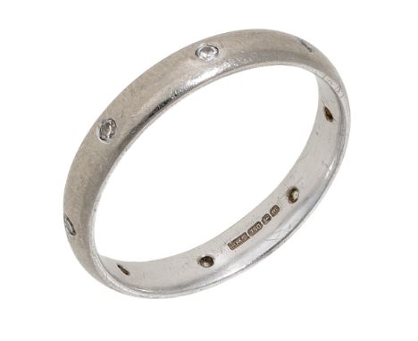 An 18ct white gold and diamond ring, set throughout with brilliant-cut diamonds, Birmingham hallmark for 2011, ring size Q.  