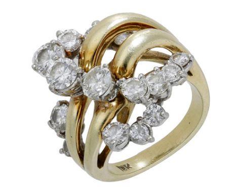 A diamond ring, the bombé ring designed as an openwork twist and scattered with brilliant-cut diamonds, stamped ‘18K’, total 