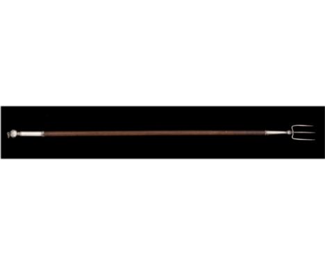 A Charles II silver mounted wooden handled toasting fork, the spherical terminal with suspension ring, with long wooden shaft