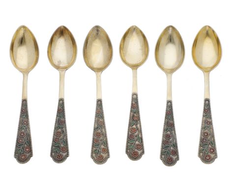 A set of six Russian (Soviet era) silver gilt teaspoons, post 1958, each handle applied with wirework and enamel flowering te
