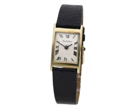 Bueche-Girod. A gold rectangular wristwatch, Ref. 7725, circa 1960. Movement: cal. 67, manual winding, 17 jewels. Dial: silve