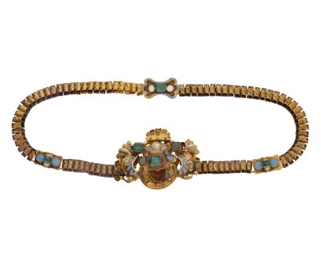 A 19th century emerald and enamel necklace, the engraved links leading to a central scroll frontispiece with scallop and fan 