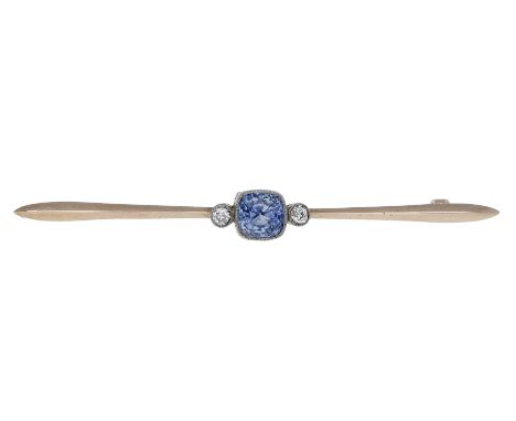 A sapphire and diamond bar brooch, circa 1900, the cushion-shaped mixed-cut sapphire between two old brilliant-cut diamonds, 