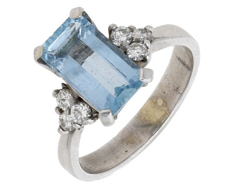 An aquamarine and diamond ring, the step-cut aquamarine claw-set between brilliant-cut diamond trefoil shoulders, ring size M
