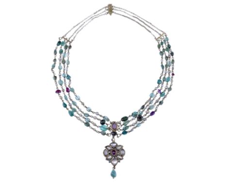 A 19th century Indian gem-set festoon necklace, the three row chain set with emerald and ruby beads and pearls, leading to a 