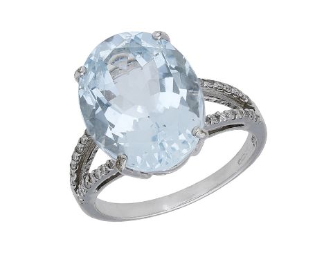 An aquamarine and diamond dress ring, the oval-cut aquamarine set between bifurcated diamond-set shoulders, mounted in 9ct go