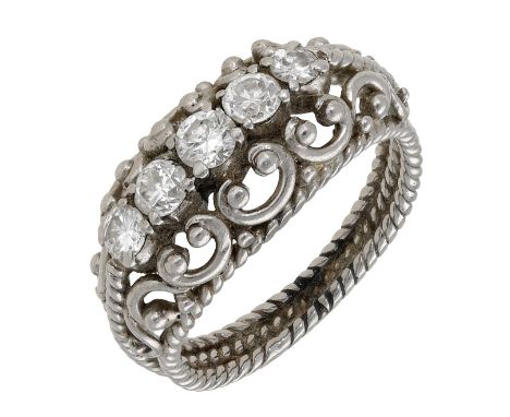 A diamond dress ring, set with a graduated row of brilliant-cut diamonds, the openwork mount of scroll design and with ropetw