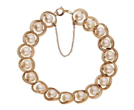 A cultured pearl bracelet, the rotating cultured pearls within interlocking wirework links, stamped ‘14K’, length 18cm.  £100
