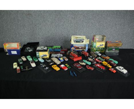 A collection of vintage toy Corgi cars. Includes an Aston Martin DB5. Condition varies from near mint to well used. L.30cm. (