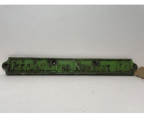 A cast iron sign PENALTY FOR NEGLECT £2, 52 cm wide, another similar, SHUT THIS GATE, 42 cm wide, both painted green, and a r