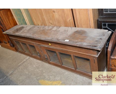 An oak and glazed cabinet (possible sideboard upper section)