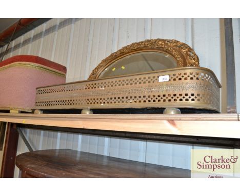 A 19th Century pierced brass fire fender 