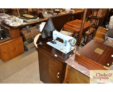 A Jones electric sewing machine, sold as collectors item