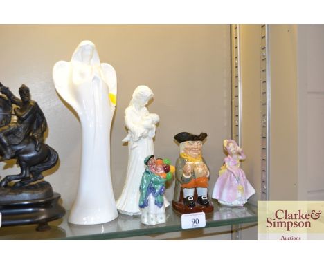 A quantity of various ornaments to include Royal Doulton "Images Angel", Royal Doulton "The Balloon Seller", Royal Worcester 