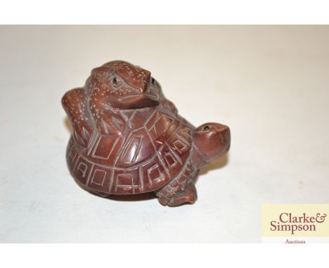 A Japanese wooden turtle Netsuke