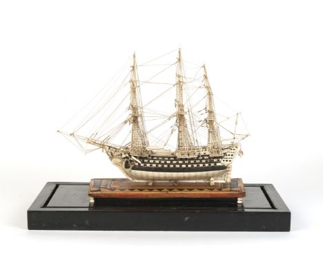 A Napoleonic 'Prisoner Of War' Bone Model Of A First Rate Ship Of The Line, French, Early 19th century,the pinned and planked