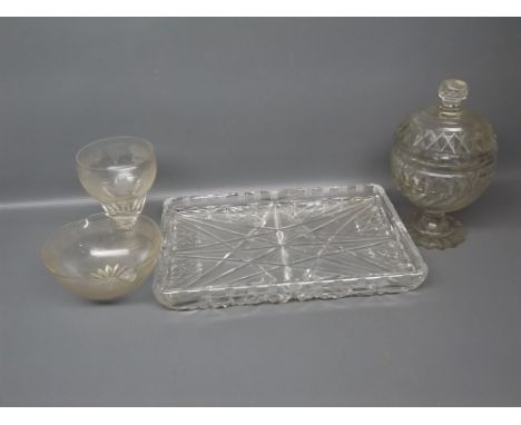 20th century cut glass dressing table tray, together with a further early 20th century grape and vine etched wine glass and a