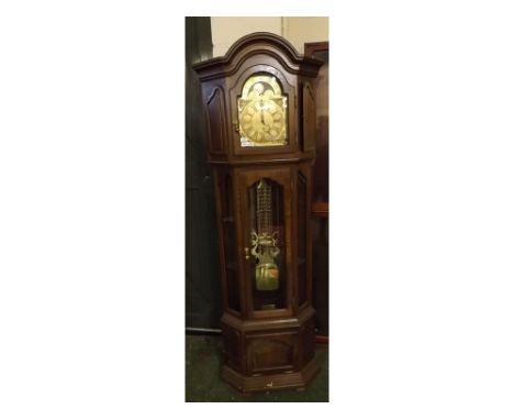 A late 20th Century Stained Oak and Glazed Floorstanding Clock, the one-piece case with overhanging cornice over hinged and p