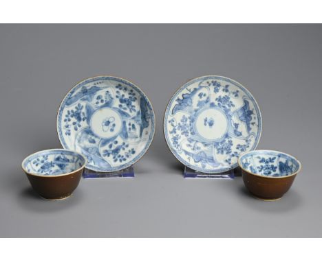 TWO MID-18TH CENTURY CHINESE EXPORT BLUE AND WHITE AND CAFE-AU-LAIT GROUND TEABOWLS AND SAUCERS. Painted to the interiors wit