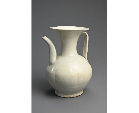 A CHINESE QINGBAI GLAZED PORCELAIN EWER, SONG DYNASTY (960-1279). Fairly heavily potted globular body of lobed form with flar