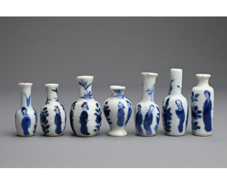 A GROUP OF CHINESE BLUE AND WHITE DOLL'S HOUSE MINIATURE PORCELAIN VASES, EARLY 18TH CENTURY. Seven vases of various forms de