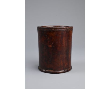 A CHINESE HUANGHUALI BRUSH POT, BITONG, QING DYNASTY. Very slightly waisted cylindrical form with carved rim and base and rec