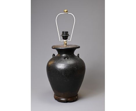 A CHINESE BLACK GLAZED STONEWARE OVIFORM VASE ADAPTED AS A LAMP. With everted rim and lug handles, on wooden base, 33.56cm hi