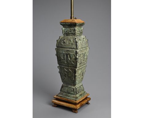 A CHINESE ARCHAIC STYLE BRONZE LAMP, 20TH CENTURY. Mounted on wooden base with lamp fitting. Vase 36cm tall. 82cm total heigh