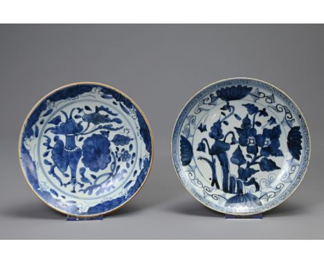 TWO CHINESE PORCELAIN BLUE AND WHITE DISHES, QING DYNASTY, each with seal mark. The first painted with a jardiniere of flower