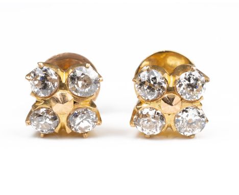 A PAIR OF HIGH CARAT YELLOW GOLD DIAMOND EARRINGS,&nbsp;MID 20TH CENTURY. Each with four round cut diamonds mounted with scre