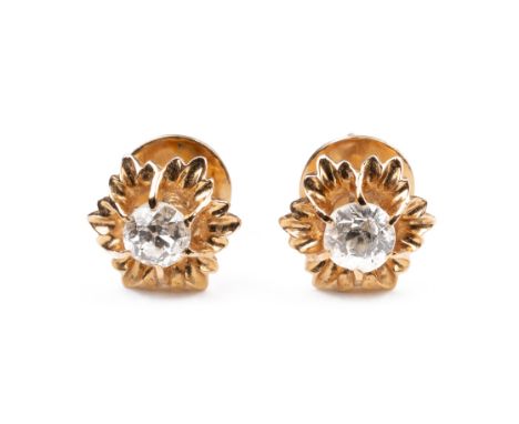 A PAIR OF HIGH CARAT ROSE GOLD STUD DIAMOND EARRINGS,&nbsp;MID 20TH CENTURY. Single round cut diamonds mounted in foliate mou