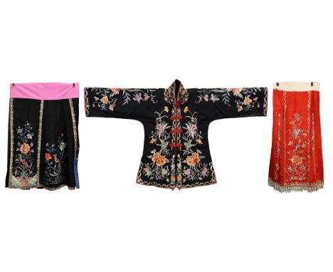 TWO 20TH CENTURY CHINESE EMBROIDERED SILK SKIRTS AND A JACKET. The first skirt in black silk embroidered with pheasants perch