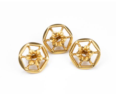 A SET OF THREE HIGH CARAT YELLOW GOLD DRESS SHIRT BUTTONS,&nbsp;MID 20TH CENTURY. Of hexagonal form with openwork flower head